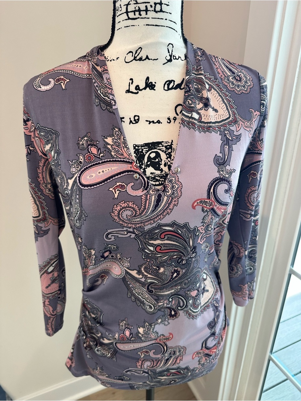 Lavender & Pink paisley pattern blouse size small with lots of stretch.